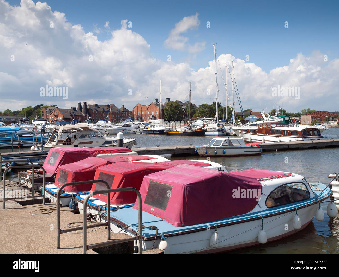 Pleasure boats and boats for hire at Oulton Broad on the river Waveney Suffolk Stock Photo