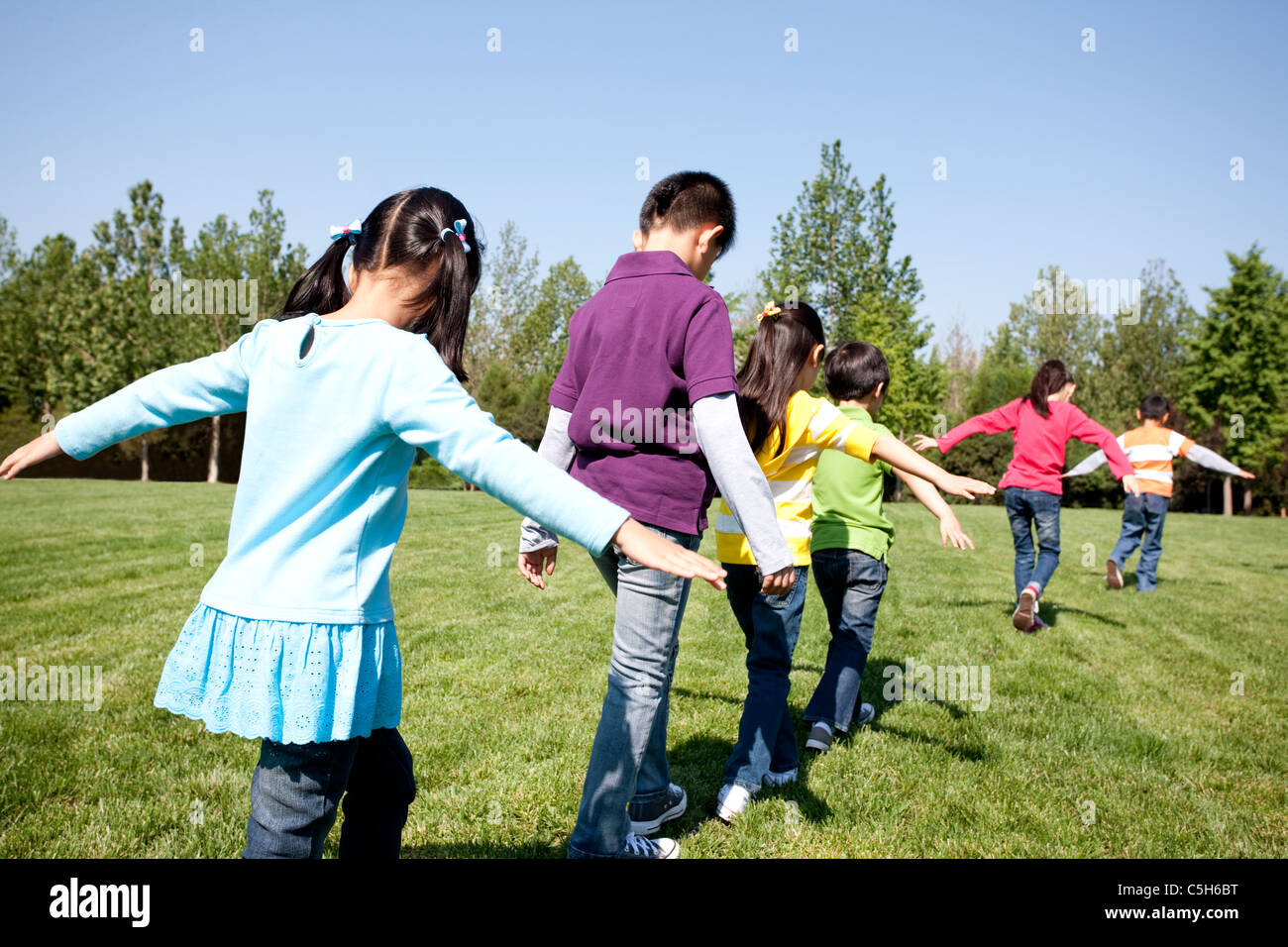 Children Playing Follow the Leader Stock Photo - Alamy