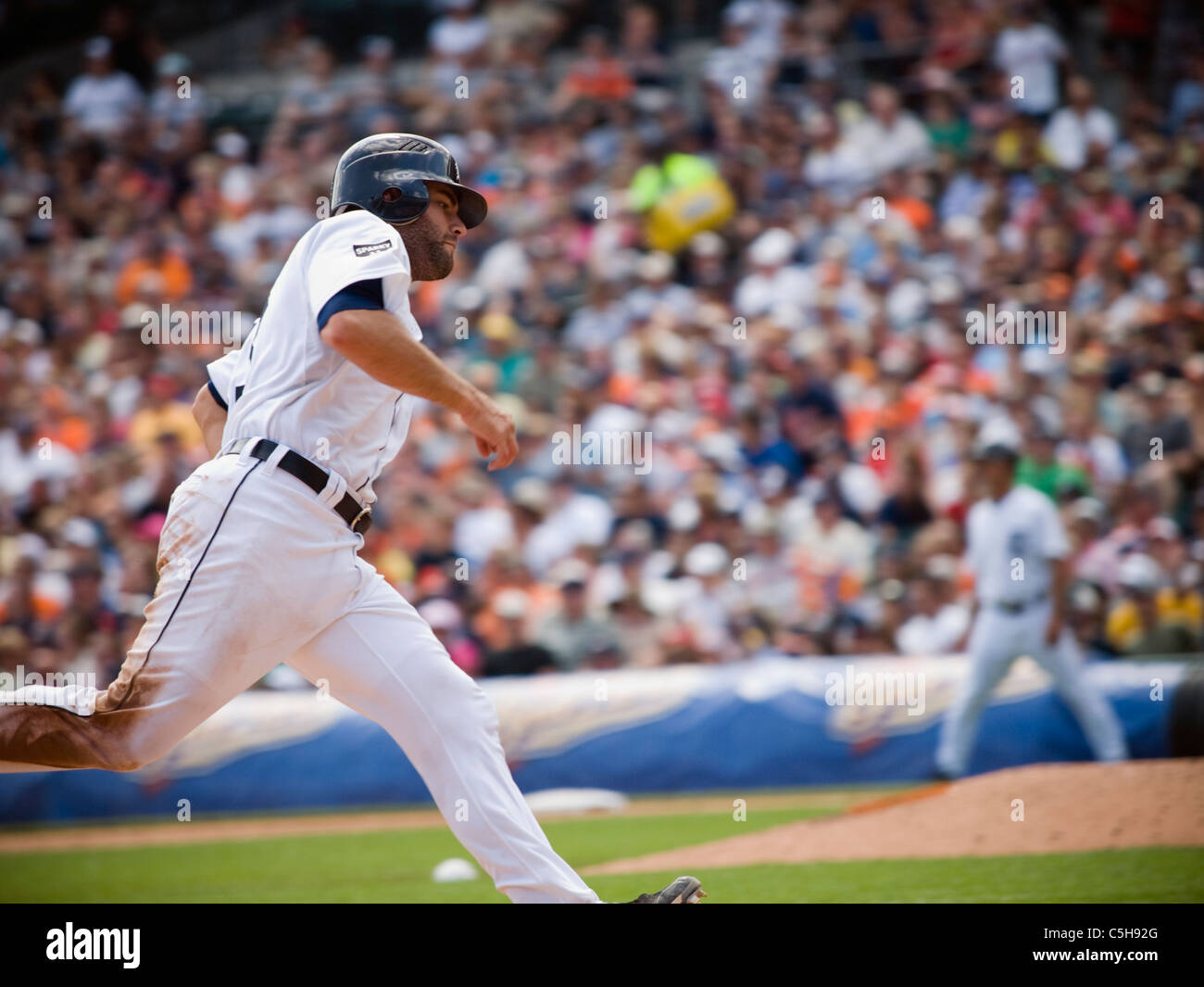 Detroit Tigers catcher Alex Avila heading towards 3rd base. Stock Photo