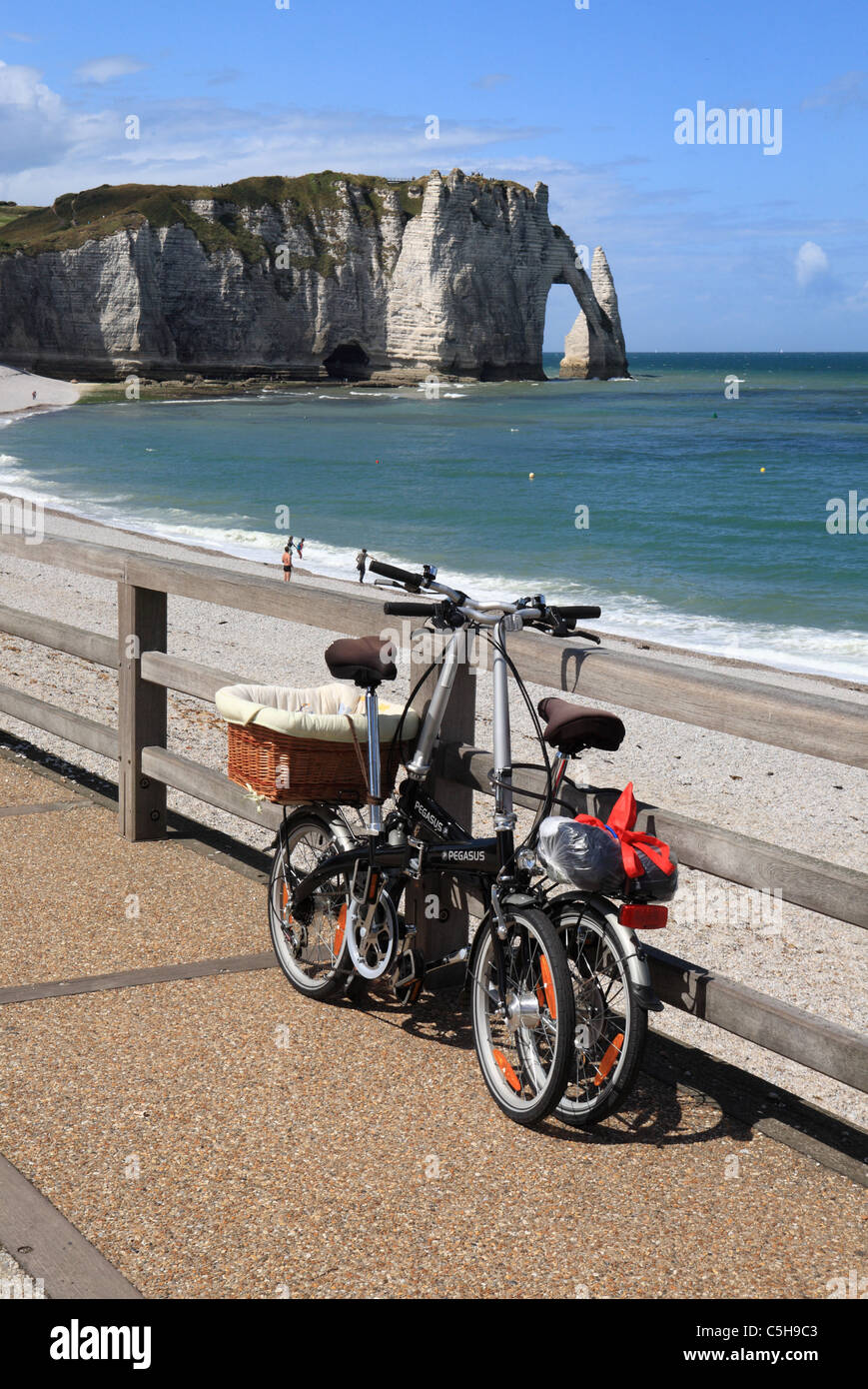 Two Pegasus folding bikes overlooking the Falaise D'Aval at Etretat, Normandy, France Stock Photo