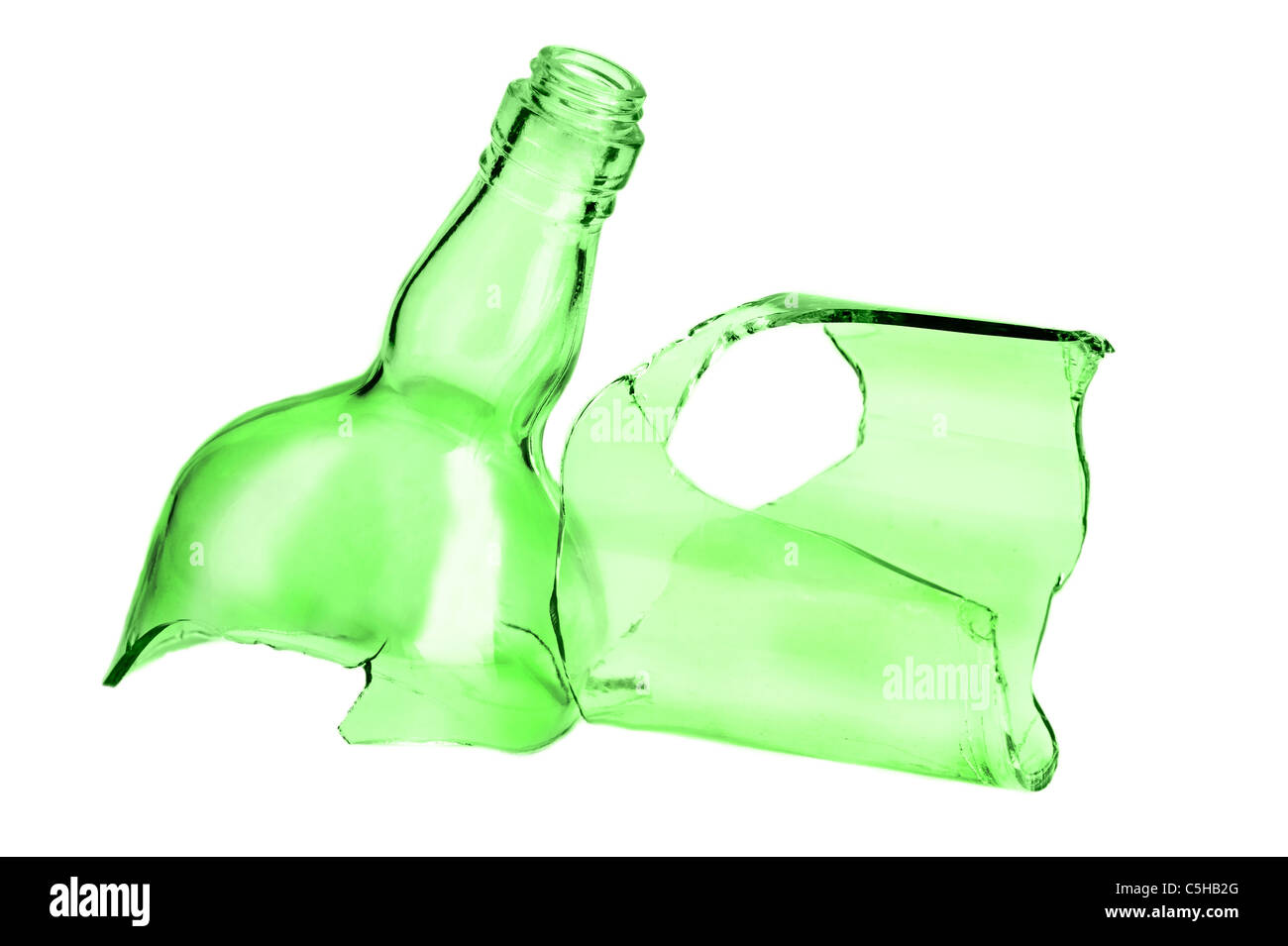Parts of broken green bottle isolated on white background Stock Photo