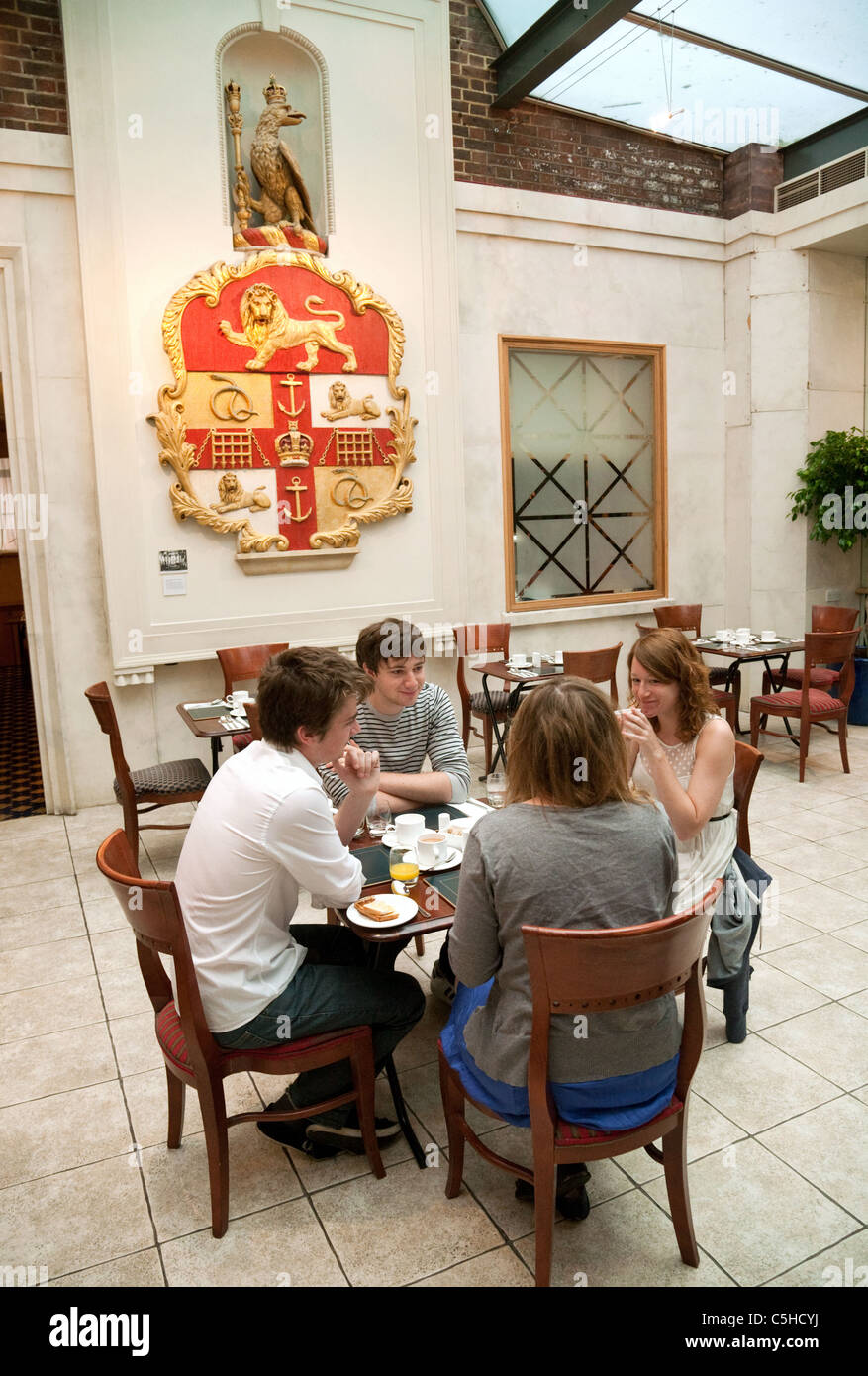 Guests having breakfast at the Royal College of Surgeons, Lincolns Inn Fields, london UK Stock Photo