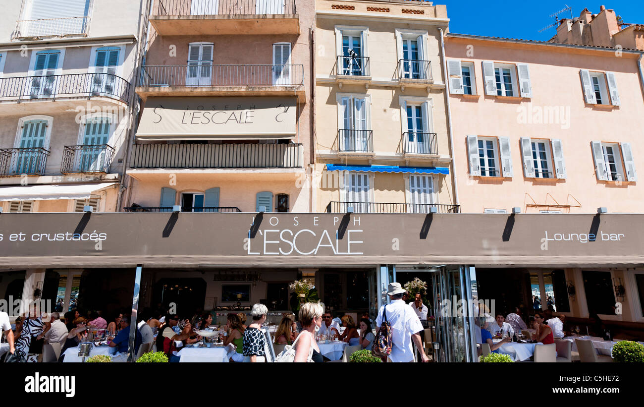 Seafront shops and restaurants, Saint Tropez, Cote d'Azure, Provence, France. Stock Photo