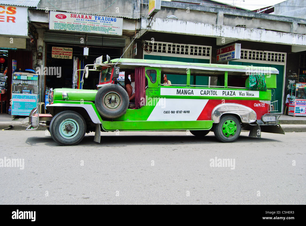 Green jeepney in Tagbilaran City of Bohol Island Stock Photo