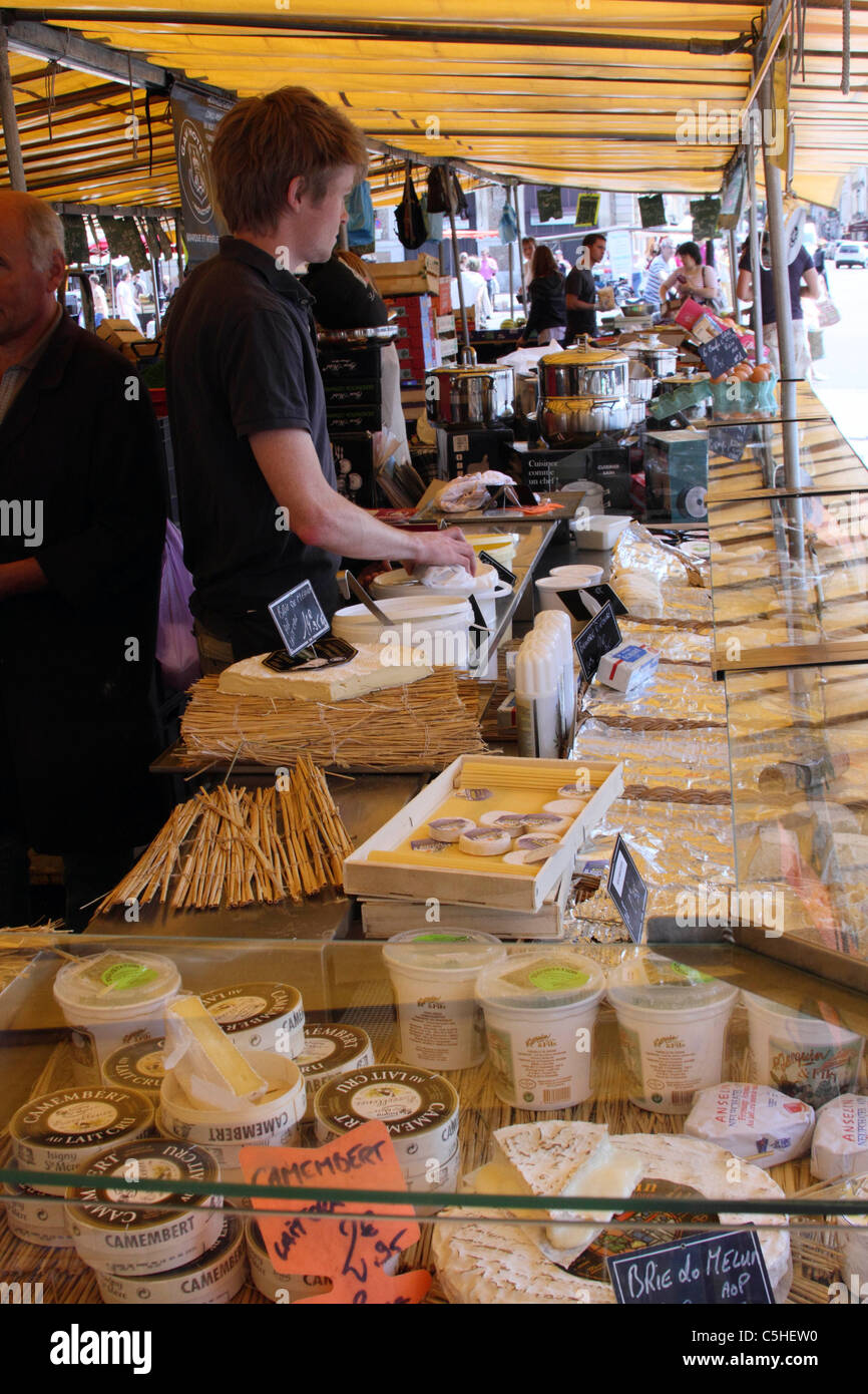 Cheese stall at a market in Paris Stock Photo Alamy