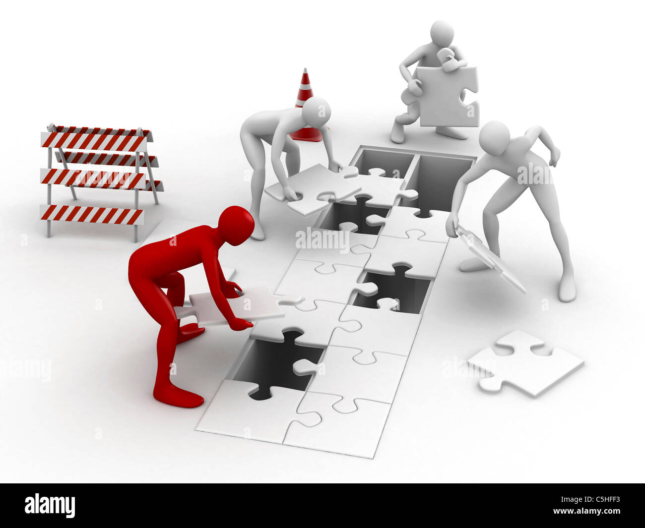 Men putting puzzle pieces together Stock Photo - Alamy