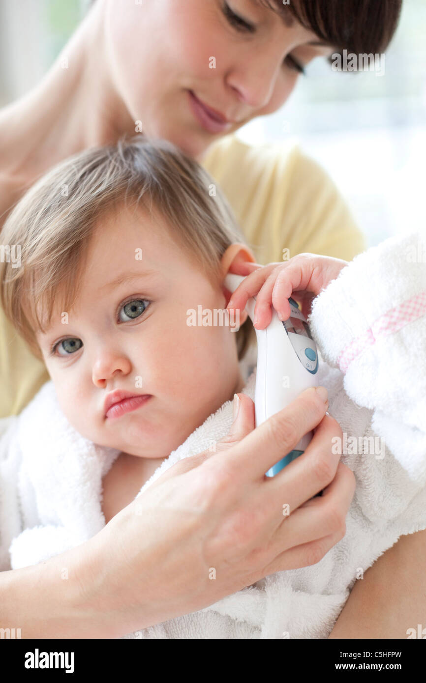 Taking a toddler's temperature Stock Photo Alamy