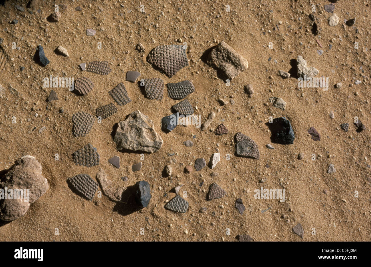 Algeria. near Djanet. Sahara desert. Prehistoric pottery and arrows. Stock Photo