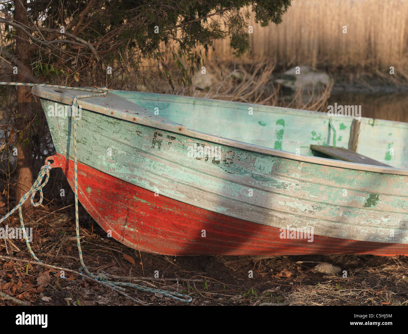 old, patina, flaking, paint, green, blue, red, rivets, boat, rowing, aluminum, edge, rear, rope