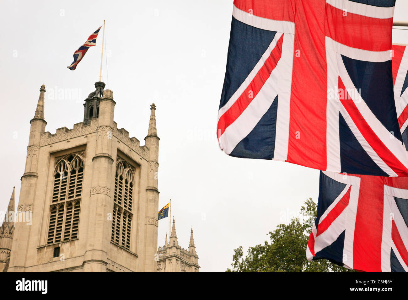 British Union Jack flags flying near Westminster Abbey. London, England