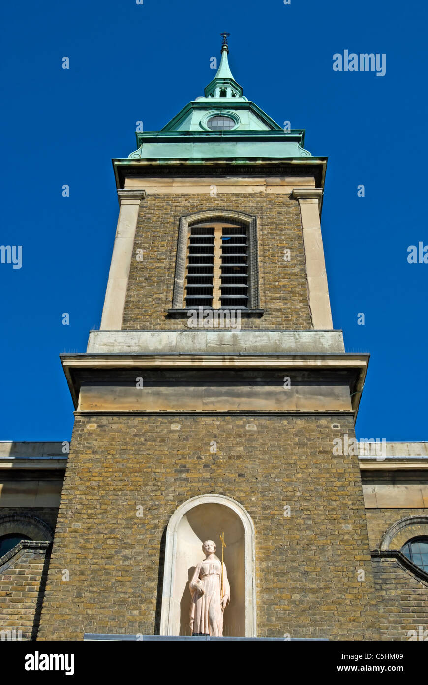 tower of the 19th century vineyard church, with niche statue, richmond upon thames, surrey, england Stock Photo