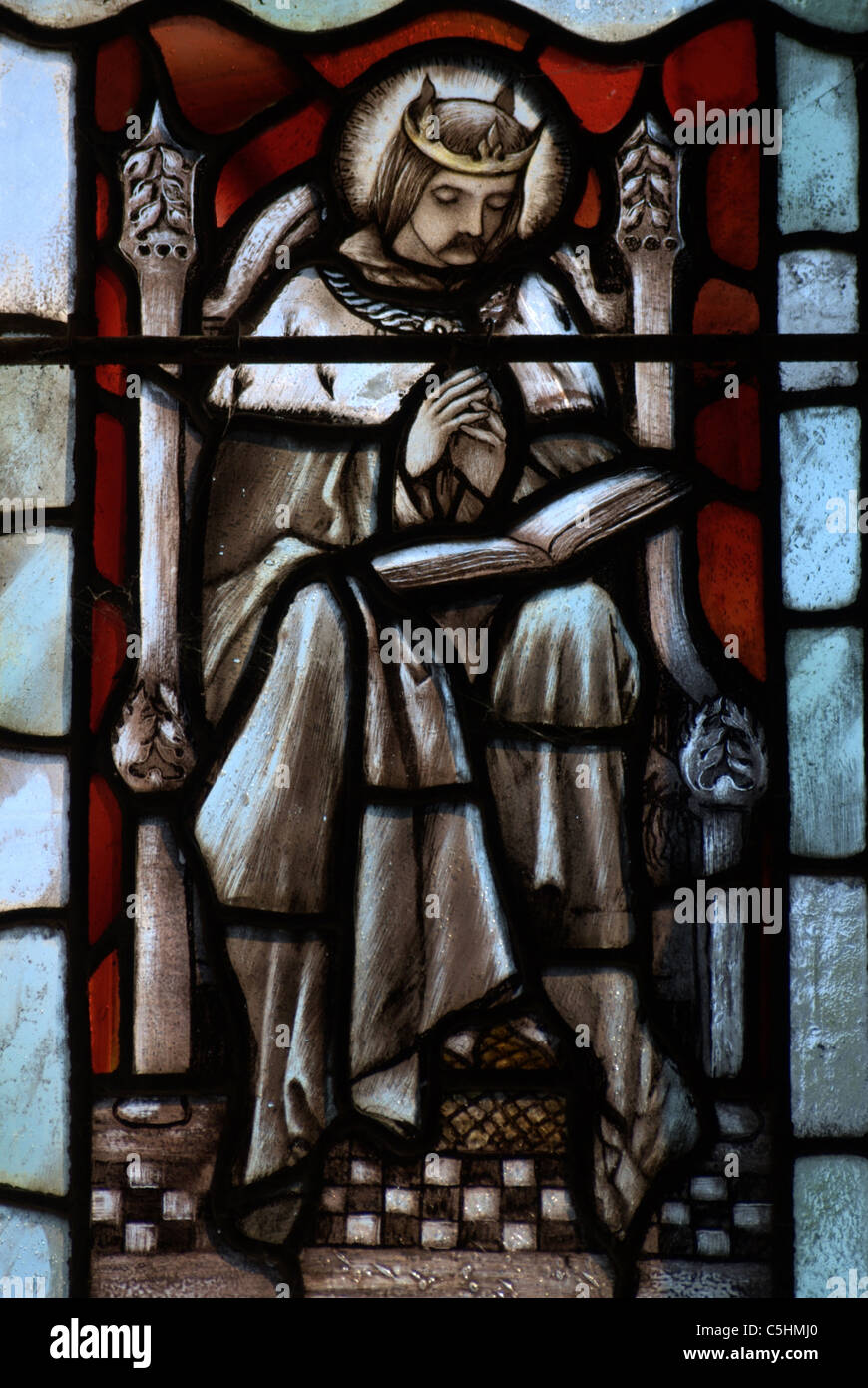 Section of stained glass depicting St.Edmond King of East Anglia Stock Photo