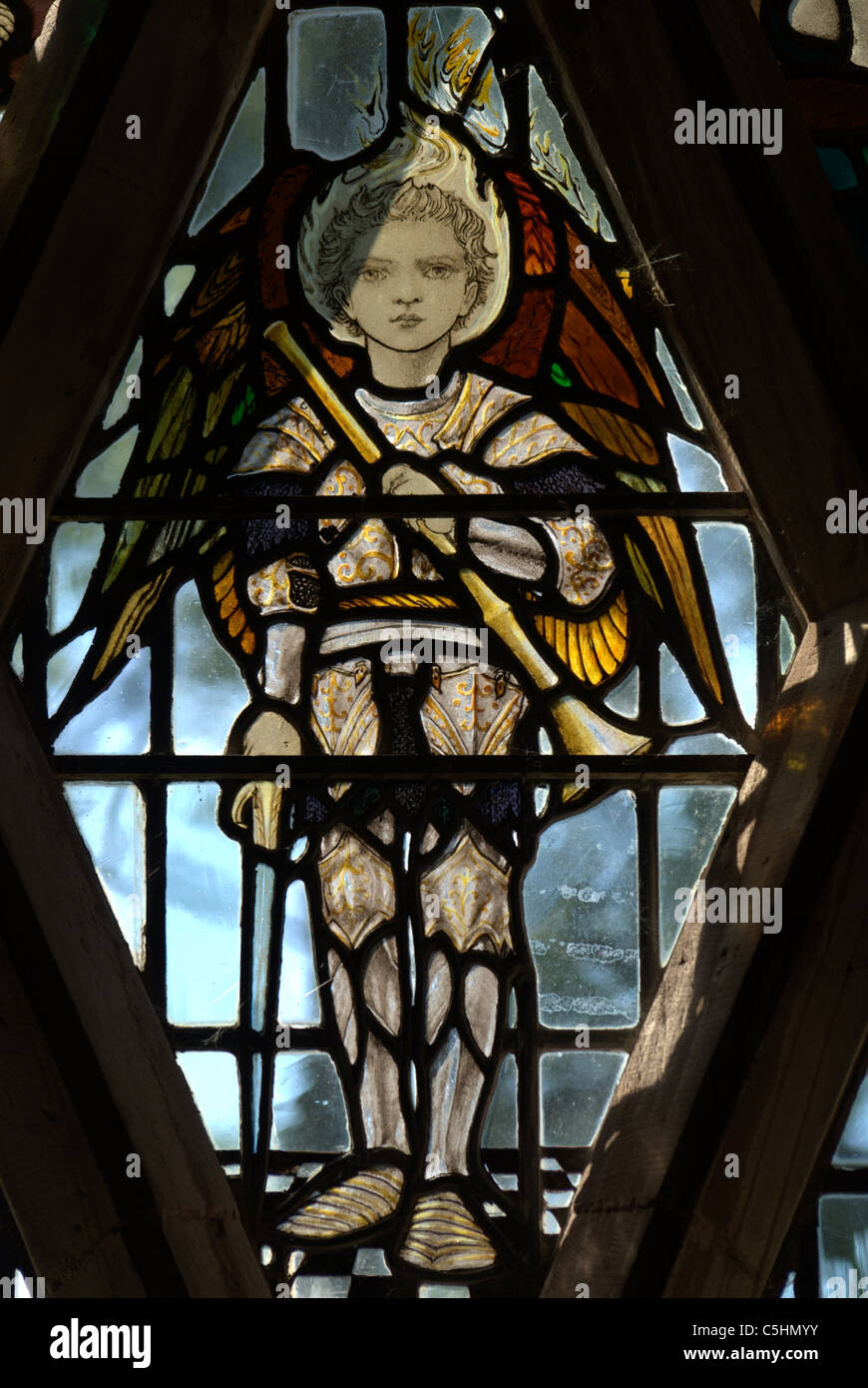 Section of stained glass depicting a musician Stock Photo
