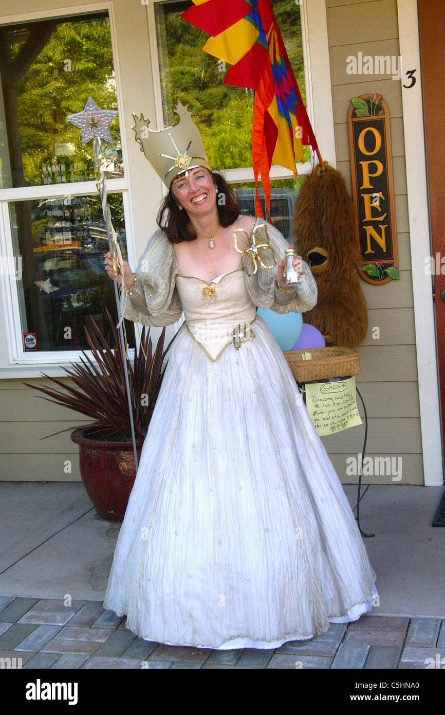 Glenda the good witch is at a store opening party in Occidental California Stock Photo