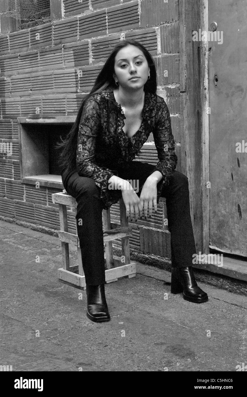 Girl sitting on wooden crate Black and White Stock Photos & Images Alamy
