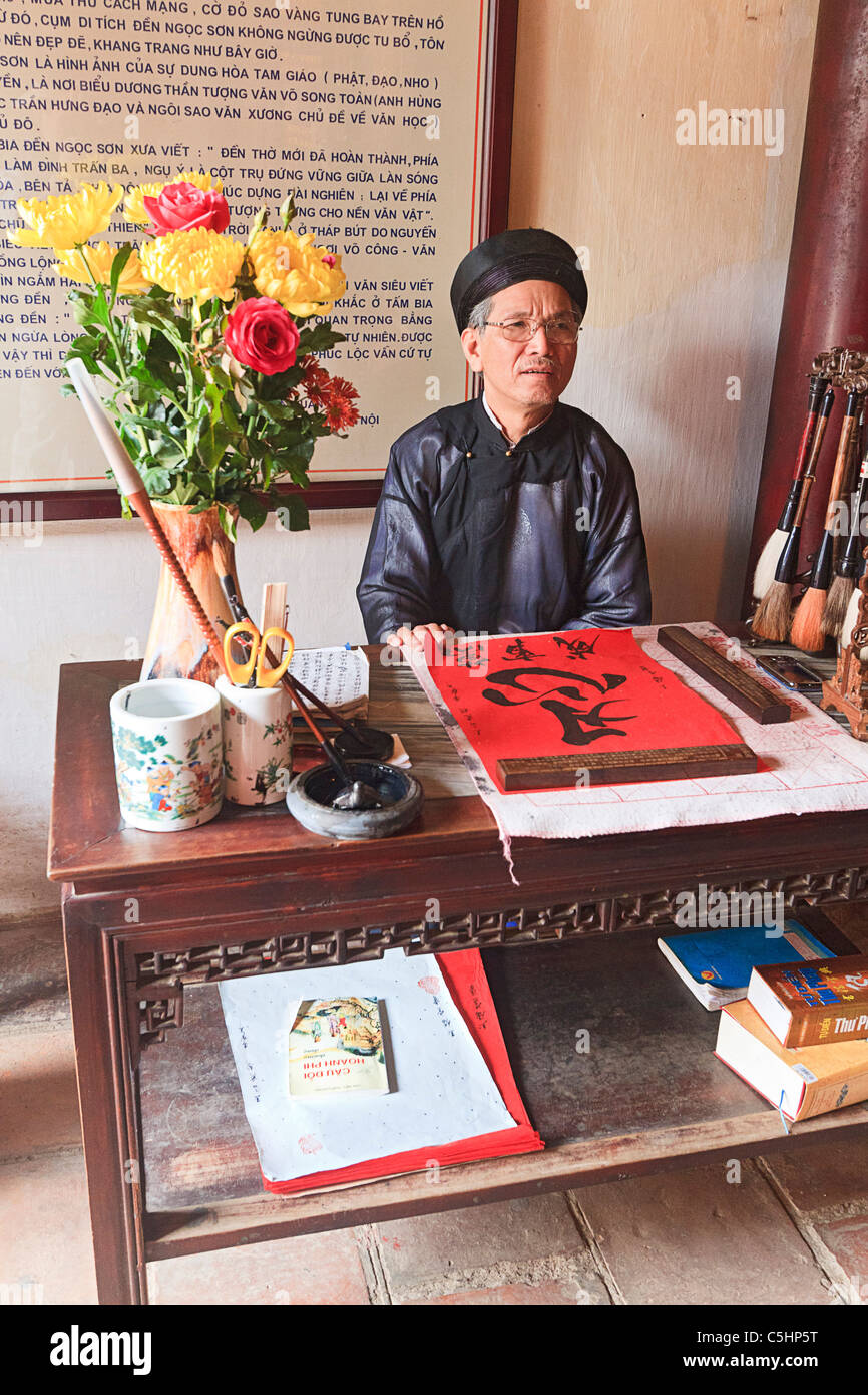 Image hình ảnh Thanh Đạo Võ Văn - Man does calligraphy in Ngoc Son Pagoda (Temple of the Jade Mound ...