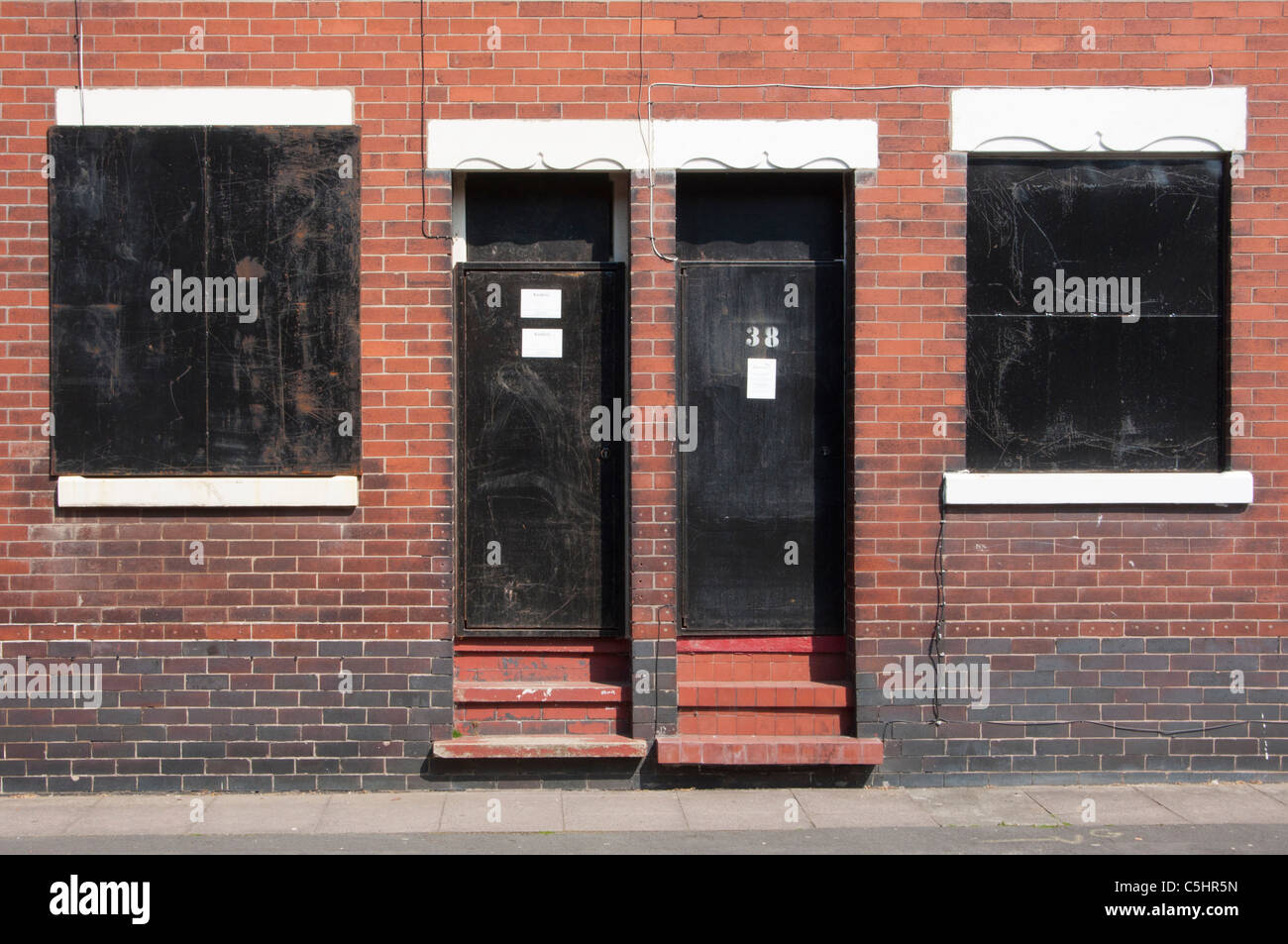 Boarded up houses near Potteries factory in Middleport, Stoke-on-Trent, Staffordshire, England. Stock Photo