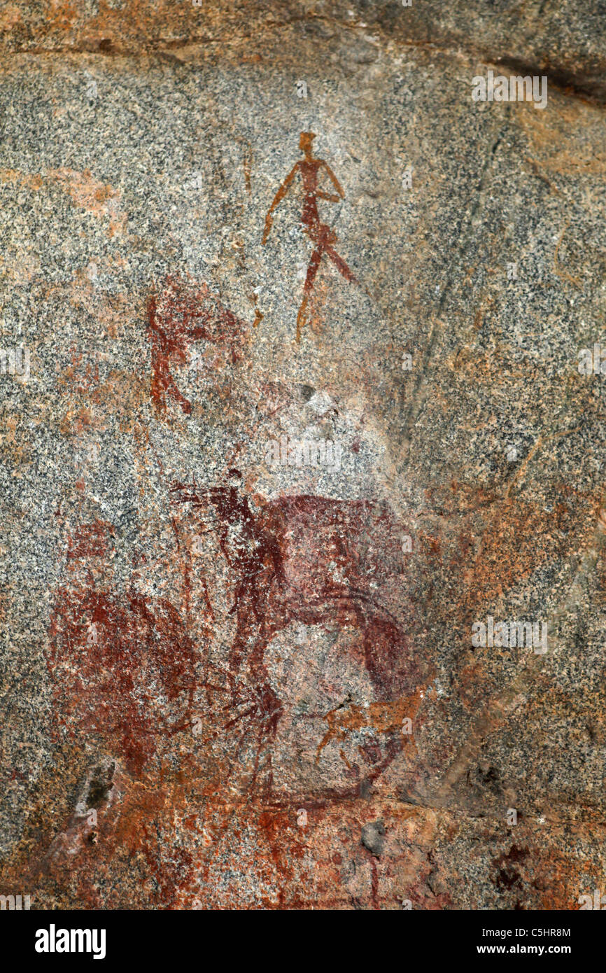 Ancient cave paintings within the White Rhino Caves at the Rhodes-Matopos National Park close to Bulawayo, Zimbabwe. Stock Photo