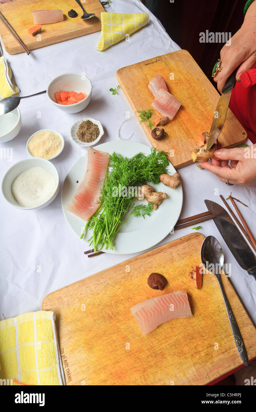Making steamed catfish at cooking class at Cafe Anh Tuyet in Hanoi