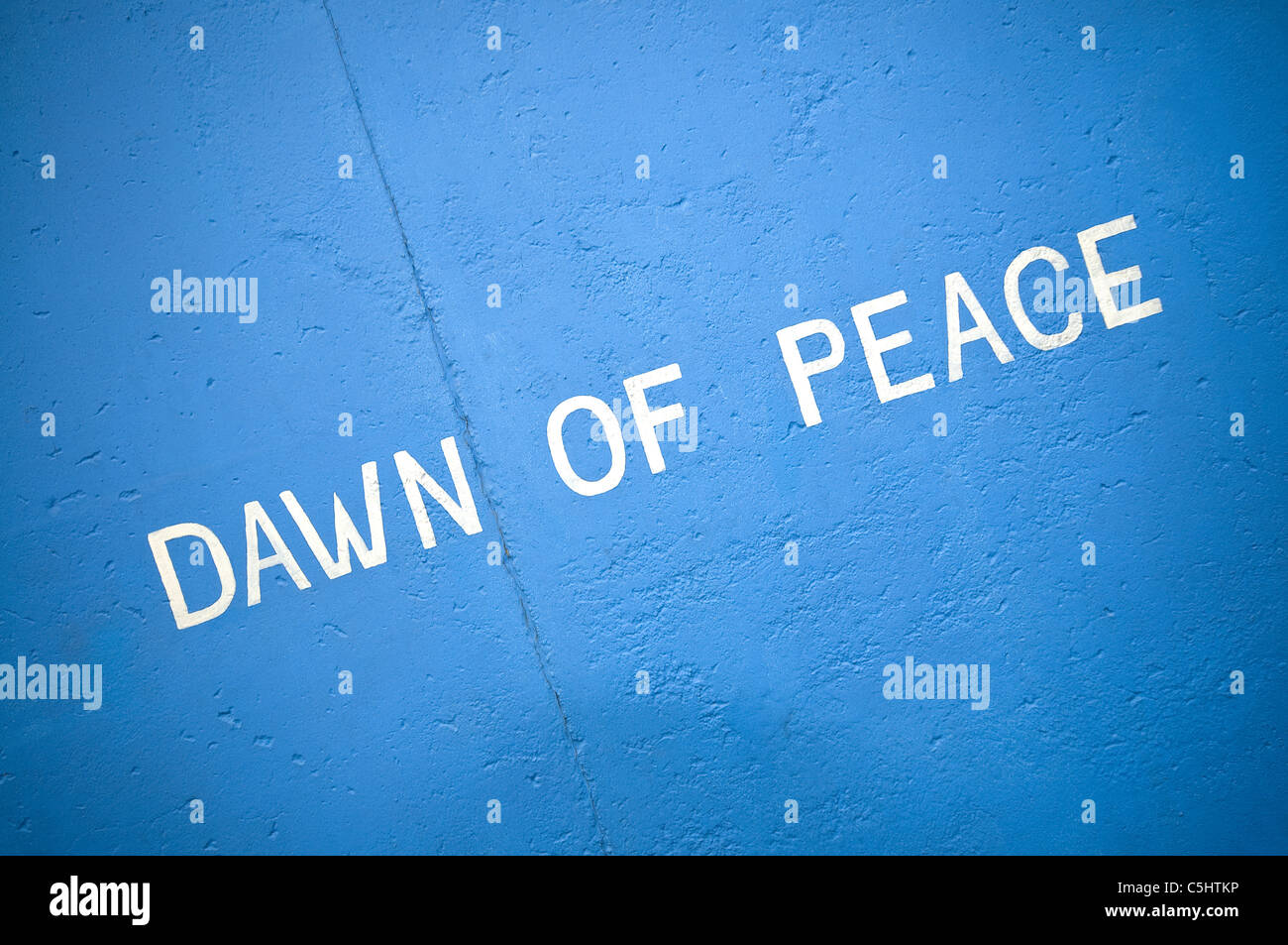 One of the many paintings at the Berlin Wall East Side Gallery, the largest open air gallery in