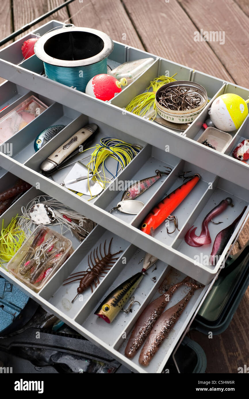 A fully stocked fishermans tackle box fully stocked with lures and gear for fishing  Stock Photo - Alamy