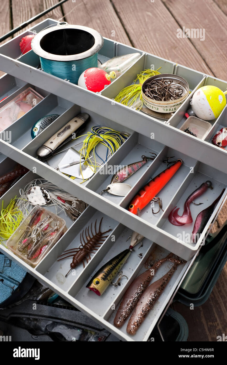 A fully stocked fishermans tackle box fully stocked with lures and