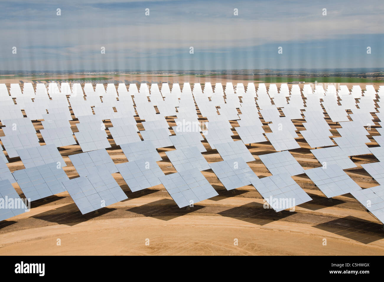 heliostats directing light to a solar power tower in the Solucar solar complex near Seville, Spain, Stock Photo