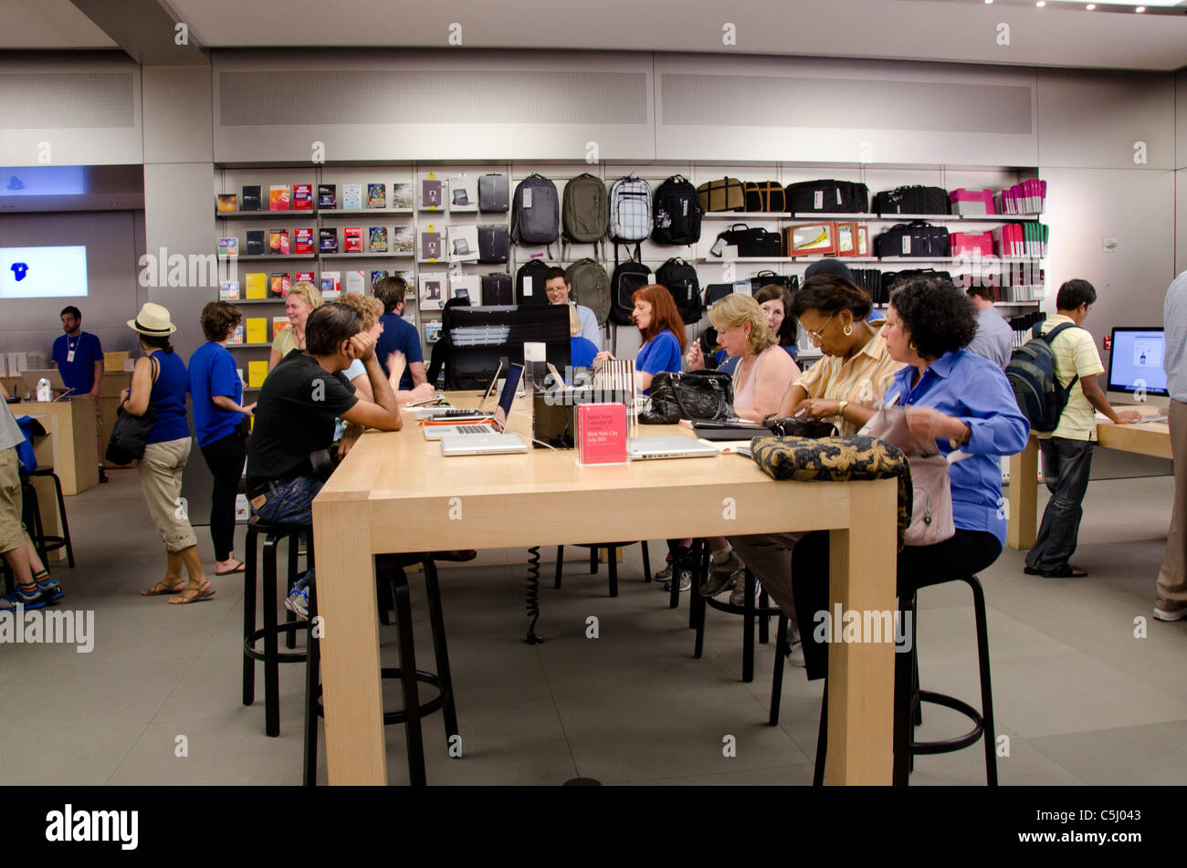 Apple retail store selling iPhones, iPads and more in sleekly designed spaces. located in Westfield UTC. with pedestrians passing by outside the store. La Jolla. San Diego, California, USA. March 23rd, 2019