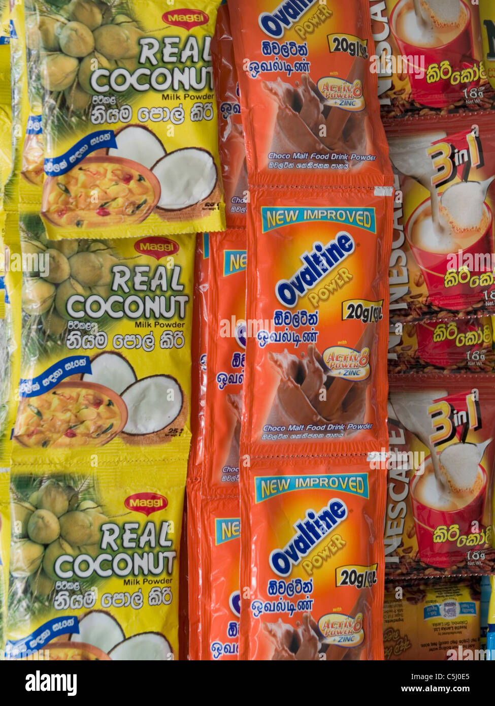 Local and western brands of food in packets in shop in Negombo, Sri Lanka Stock Photo