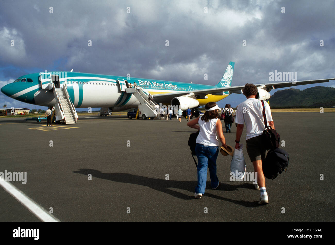 St Lucia Hewannora International Airport BWIA West Indies Plane People Departing Stock Photo
