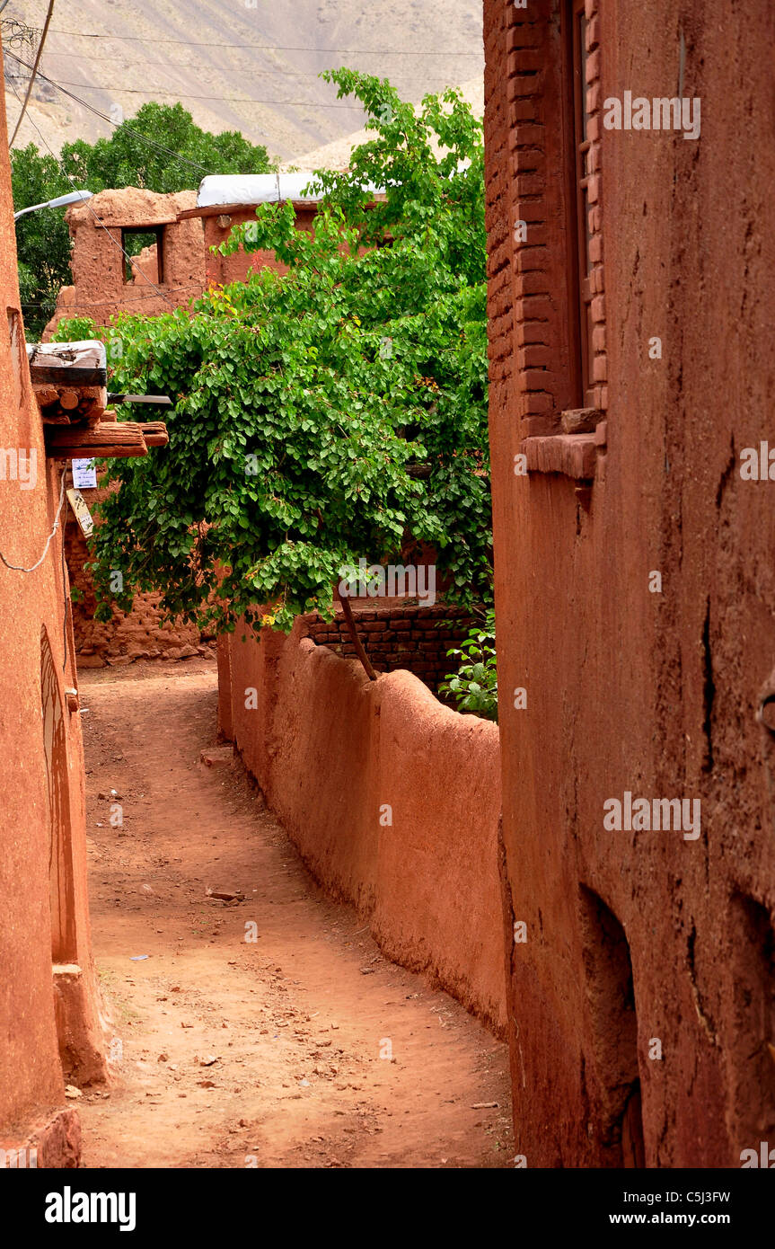 Abyaneh is a famous historic Iranian village near the city of Natanz in Isfahan, Iran characterized by a peculiar reddish hue. Stock Photo