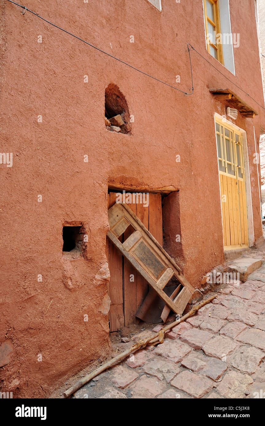 Abyaneh is a famous historic Iranian village near the city of Natanz in Isfahan, Iran characterized by a peculiar reddish hue. Stock Photo