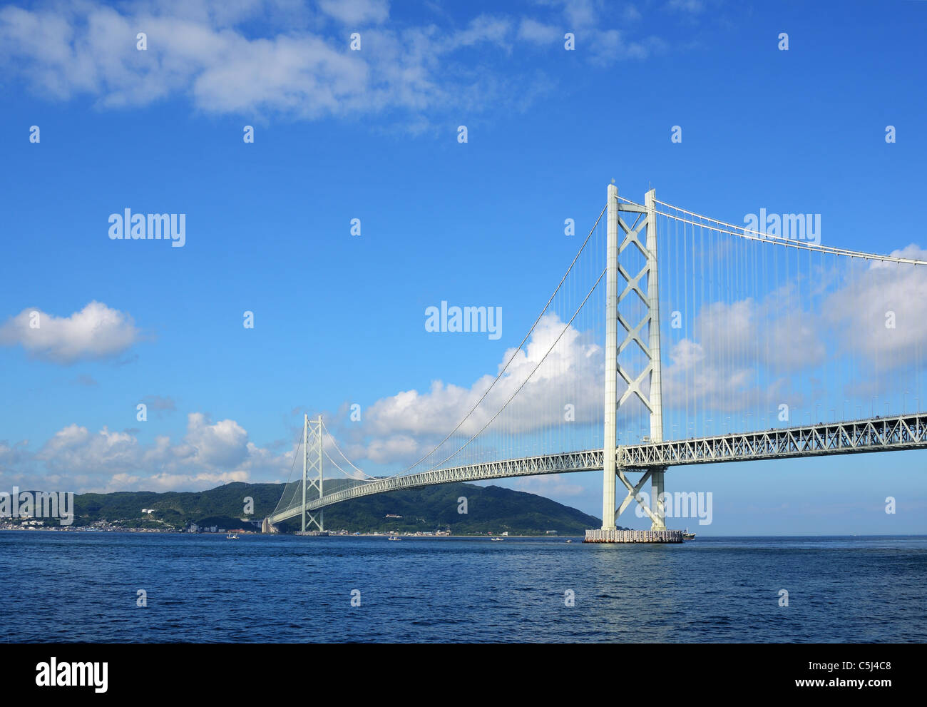 Akashi Kaikyo Bridge in Kobe, Japan has the longest central span in the world. Stock Photo