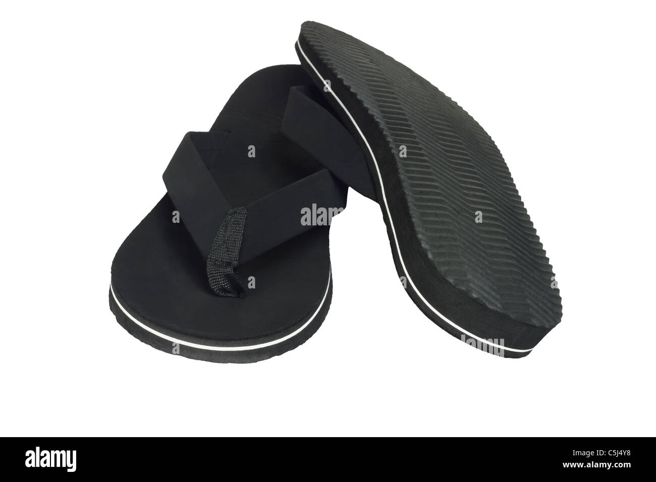 Pair of black flip flops casual footwear on white background Stock ...