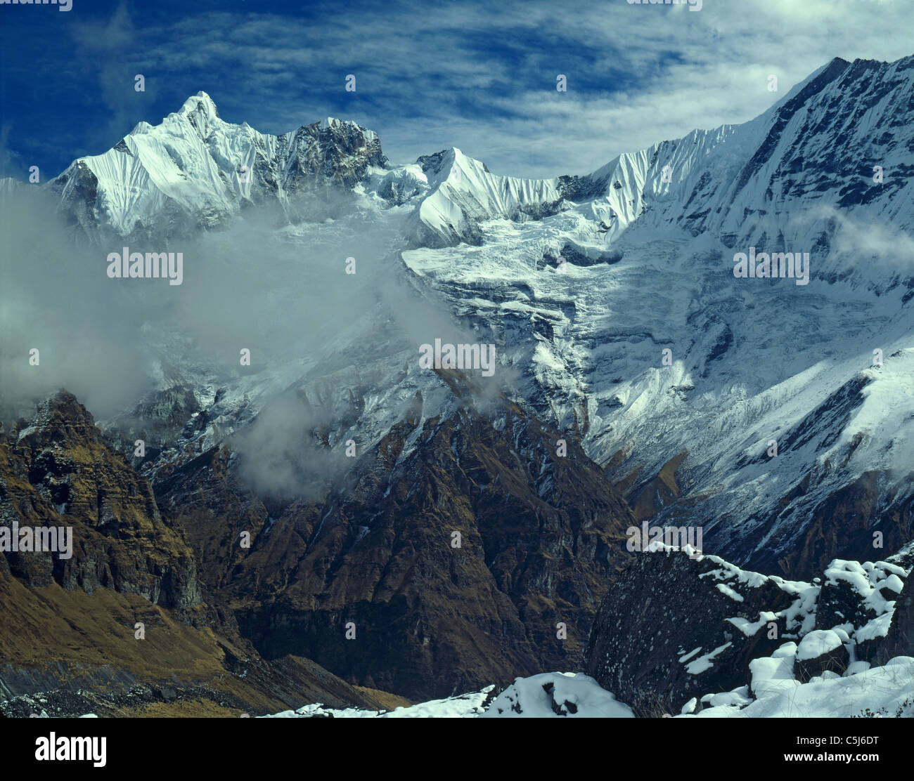 The high Himalayan ridge leading from the shoulder of Machapuchare, the ...