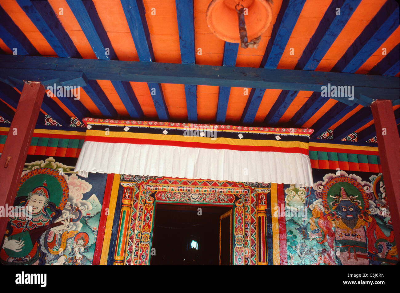 The recently painted main entrance into Vigu monastery or gompa -an important regional centre of Tibetan Buddhism, Rolwaling Stock Photo