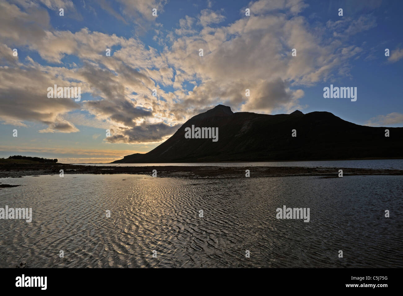 The island of Aldra from the shore at Haugland in evening light, north-west Norway. Stock Photo