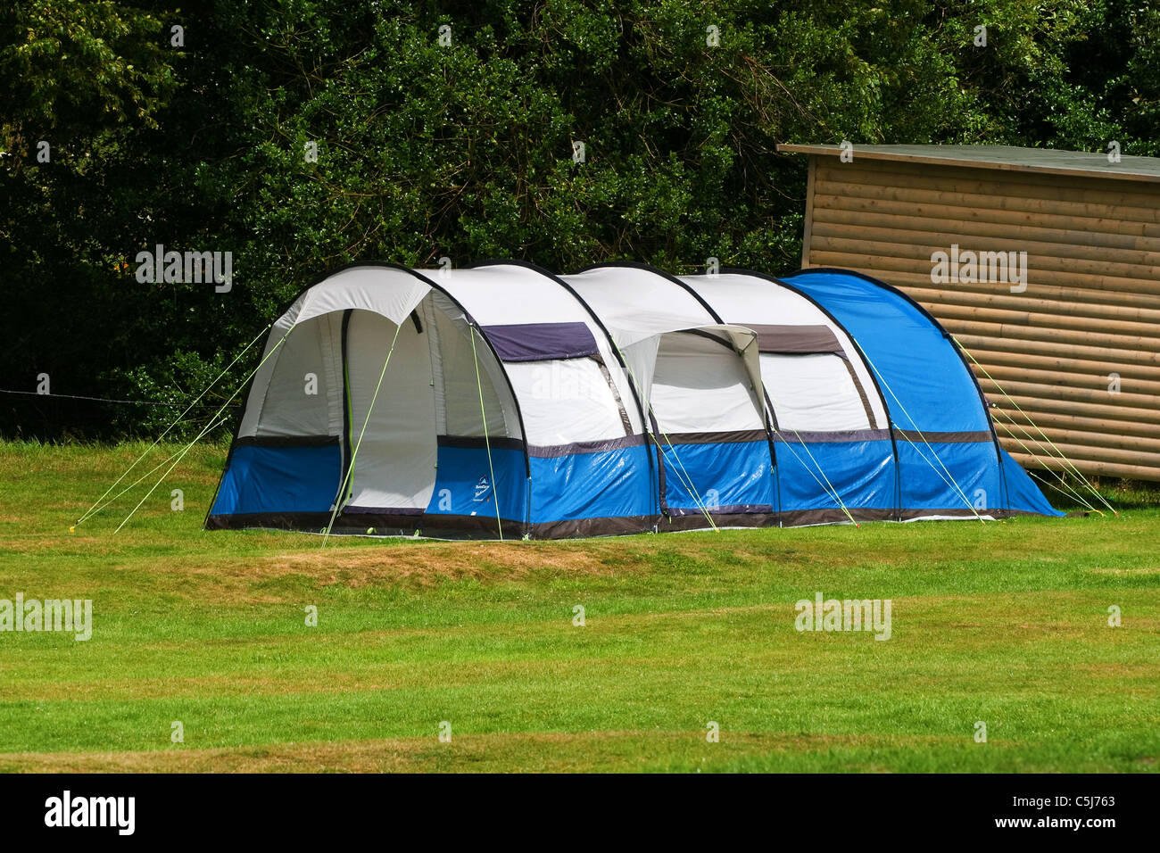 Camping holiday, large wet tent after a downpour of rain Stock Photo