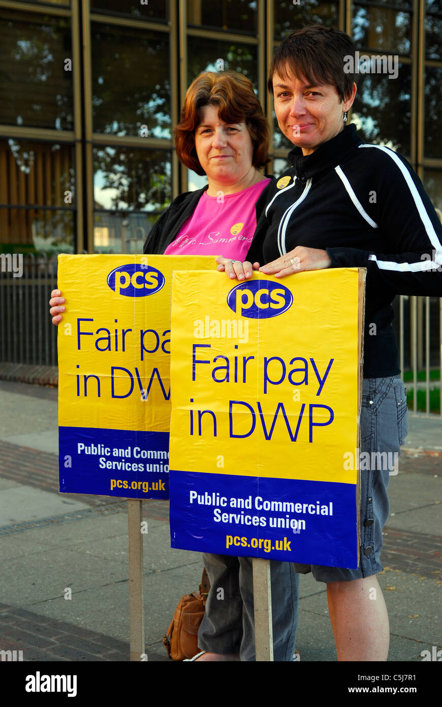 PCS members on picket line outside job centre during strikes against public sector cuts