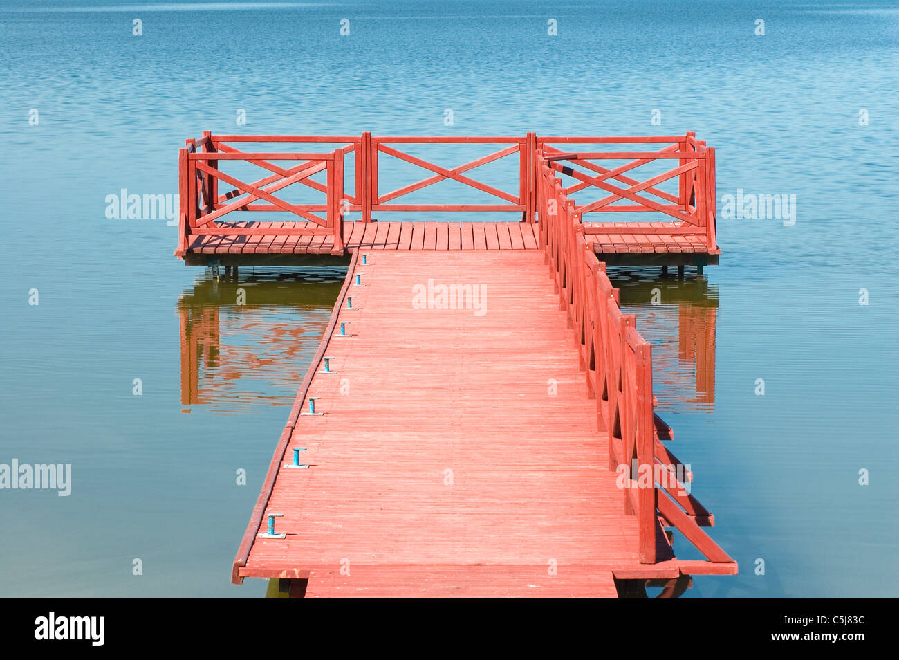 Footbridge on the lake in Masuria district, Poland Stock Photo