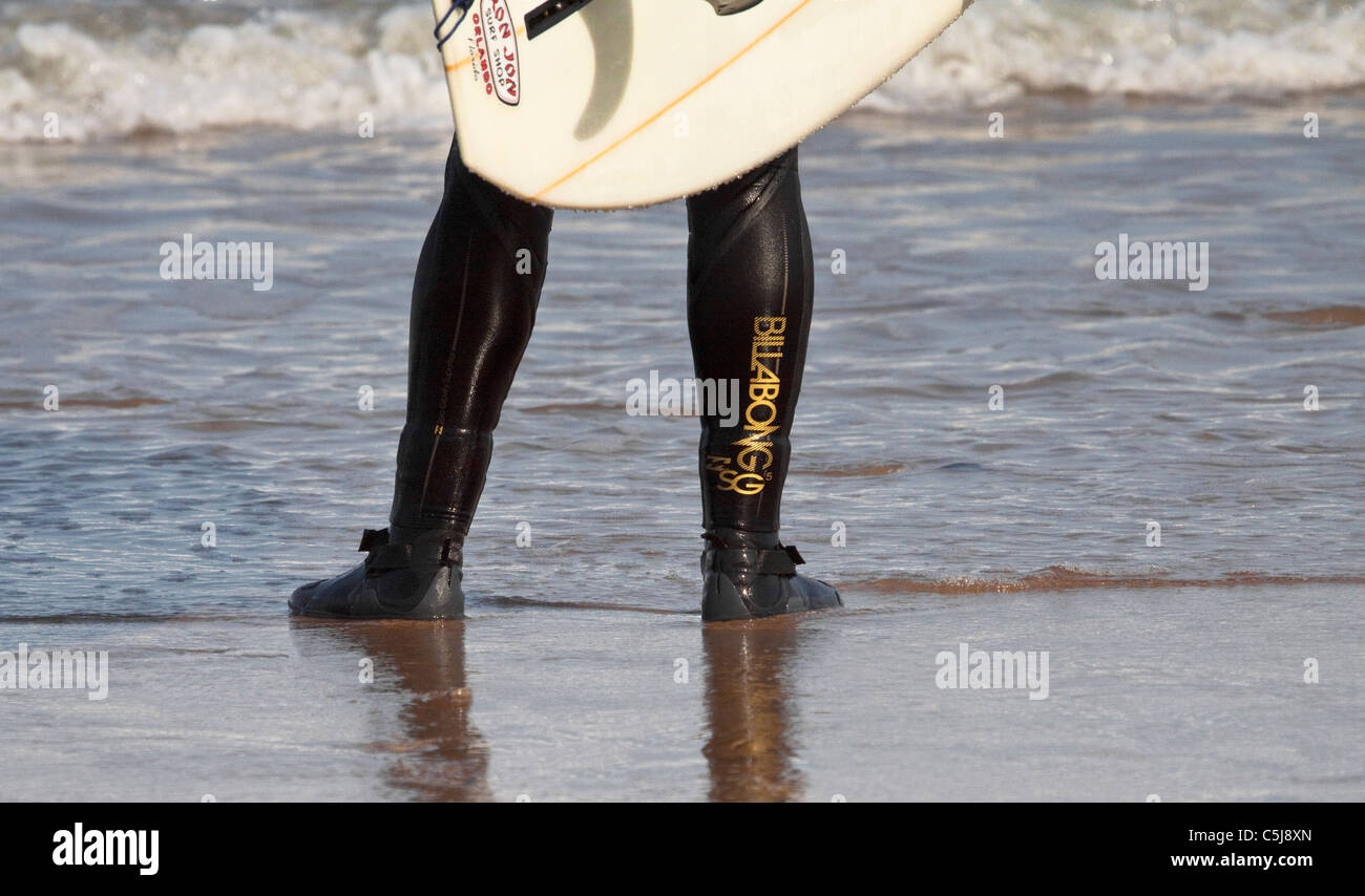 Surfer standing surfboard on beach hi-res stock photography and images ...
