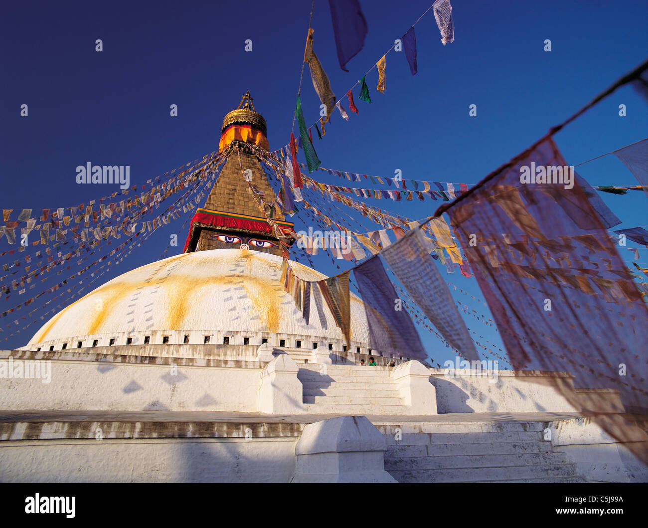 The Great Stupa in the Tibetan quarter at Boddnath or Bauda in the Kathandu valley, Nepal Stock Photo