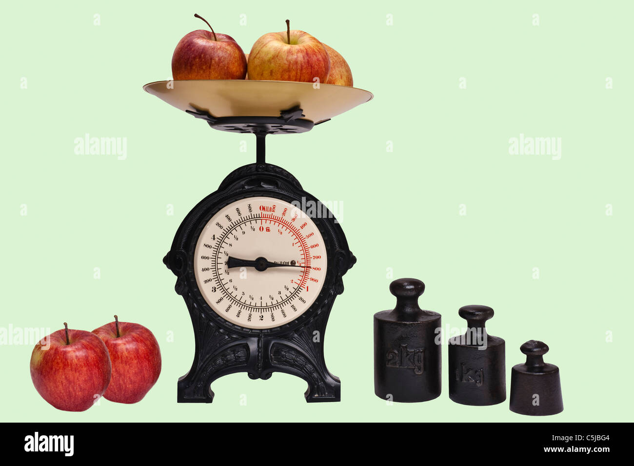 Two apples on a digital kitchen scale - Stock Image - H305/0140 - Science  Photo Library