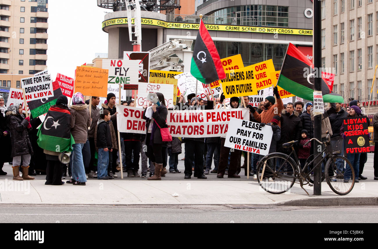 People gather in Yonge Dundas Square to support anti-government protests in Libya. March 13, 2011, Toronto, Canada Stock Photo