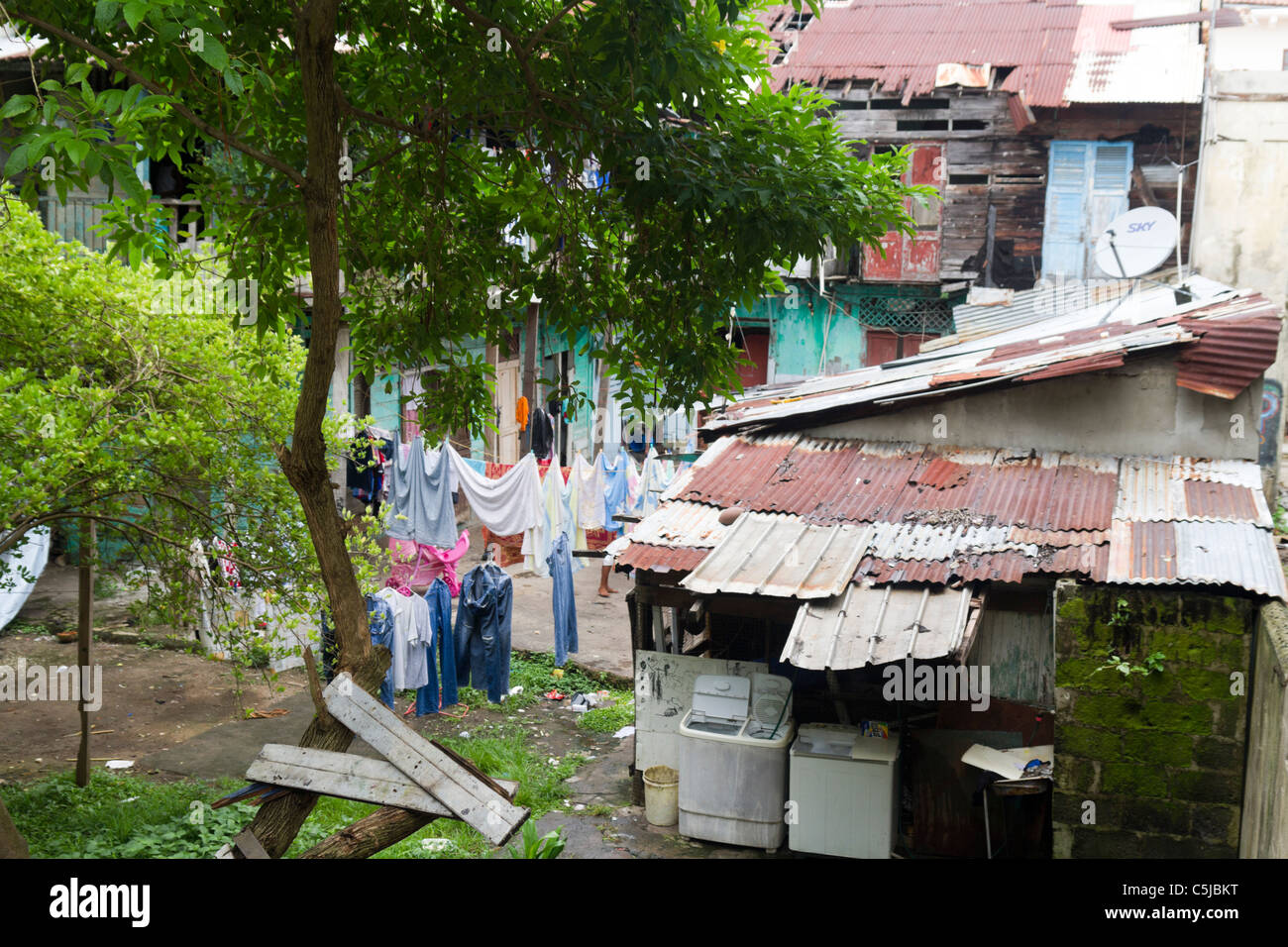 Low income shanty with a satellite dish. Panama City, Republic of Panama, Central America Stock Photo