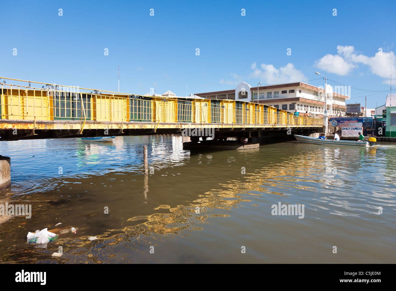 The Belize City Swing Bridge spans the Belize River in downtown Belize City, Belize Stock Photo