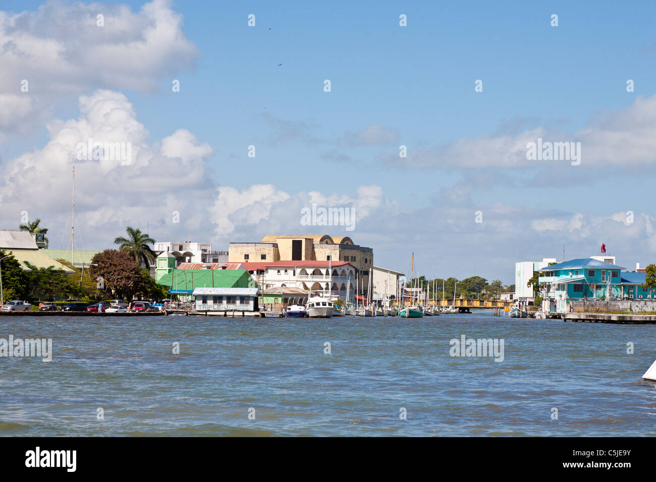 Boats moored in the mouth of Haulover Creek in the tourist district in Belize City, Belize Stock Photo