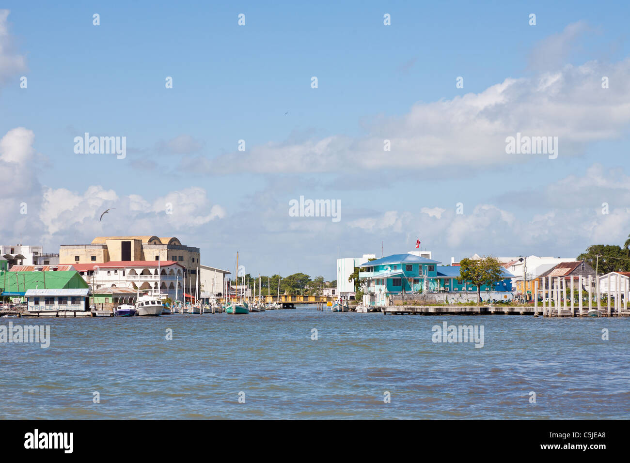 Boats moored in the mouth of Haulover Creek in the tourist district in Belize City, Belize Stock Photo