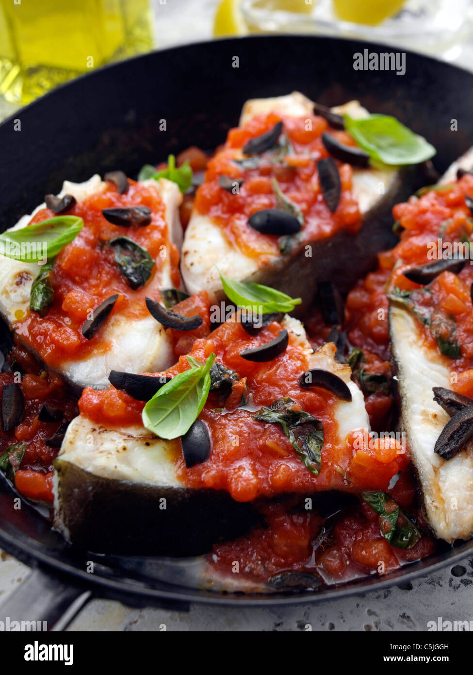 Halibut frying in a pan Stock Photo Alamy
