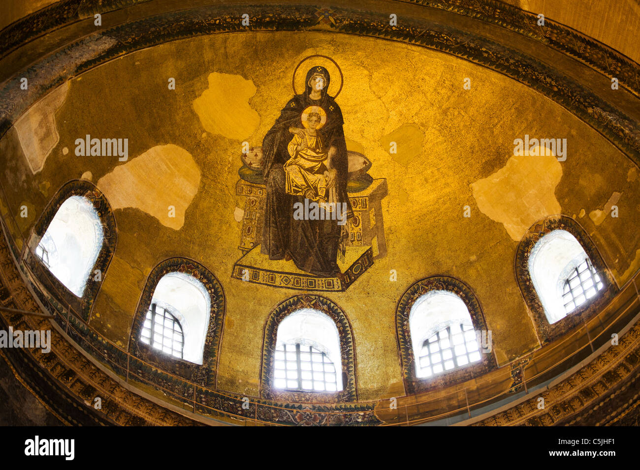 Blessed Virgin Mary with baby Jesus Byzantine mosaic art on the Hagia Sophia apse in Istanbul, Turkey. Stock Photo
